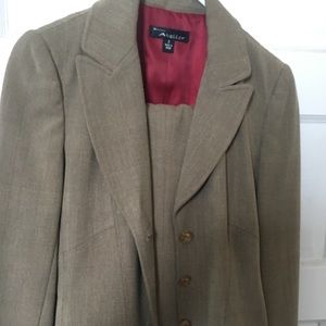 Women’s suit. Tan color